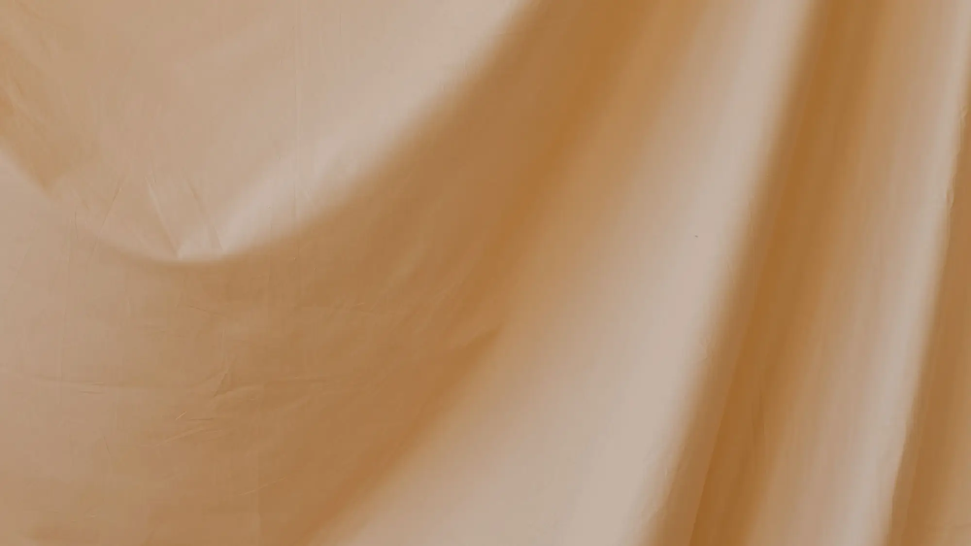 Tissu beige drapé